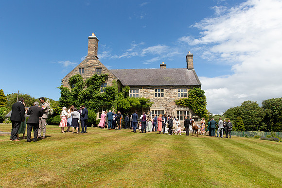 Sunlit Socials: Guests Mingling at Talhenbont Hall