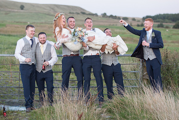 Celebrate Your Love: Groomsmen Lifting the Bride in Joy at The Wellbeing Farm